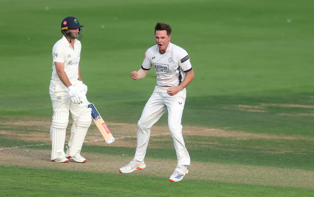 CARDIFF, WALES - AUGUST 27: Sonny Baker of Hampshire celebrates taking the wicket of Chris Cooke of Glamorgan after travelling back from Lord's to join up with his team during day one of the Rothesay County Championship Division 1 match between Glamorgan and Hampshire at Sophia Gardens on August 27, 2026 in Cardiff, Wales. (Photo by Dan Mullan/Getty Images)